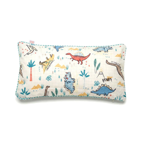 Kids' pillow with dinosaur pattern on a white background