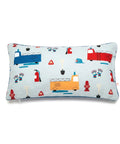 Decorative pillow with colorful fire truck and safety gear pattern on a white background