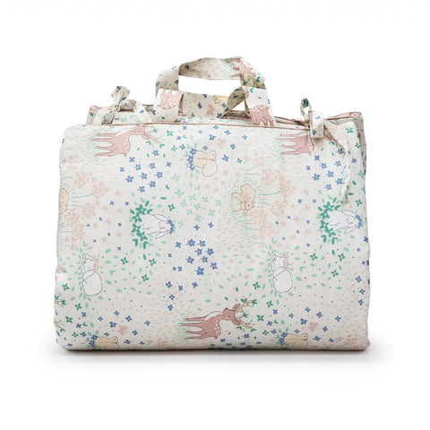 Floral patterned bag with forest animal designs on a white background