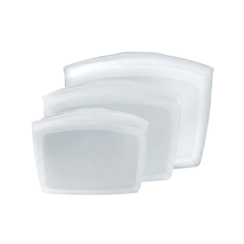 Three white silicone snack pouches on a white background