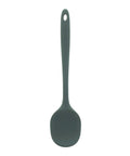 Green silicone spoon on a white background