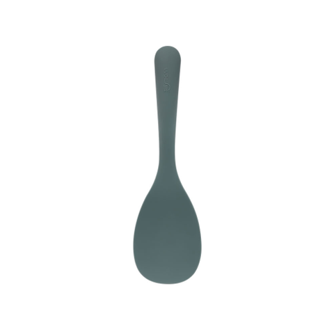 Dark green silicone rice spoon on a white background