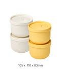 Set of stacked containers, two white and two yellow, on a white background.