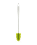 Cleaning brush with lime green brush head on a white background