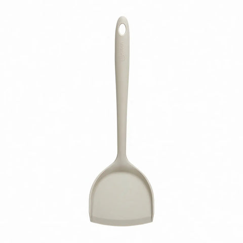 Gray wide spatula on a white background