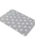 Kids blanket with textured gray base and white teddy bear pattern on a white background