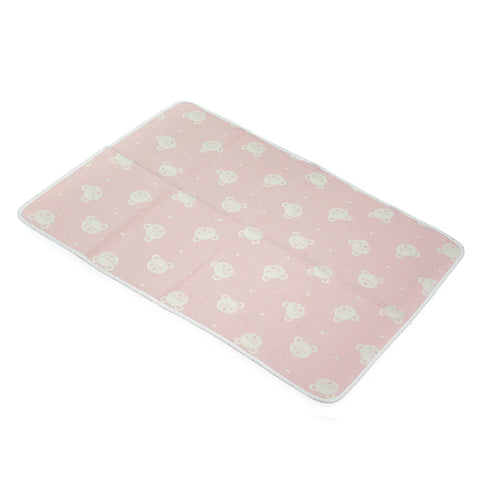 Pink mat with white pattern on a white background