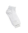White sock with a brand label on a white background