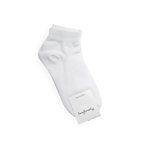 White sock with a brand label on a white background