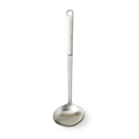 Stainless steel ladle on a white background.
