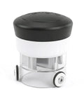 Small cylindrical manual food chopper with a black lid on a white background
