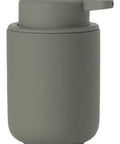 A matte green cylindrical soap dispenser shown on a plain white background.