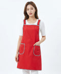 Person wearing a red apron with white background