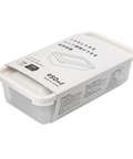 White plastic food storage container with a matching lid, shown with a paper label that reads 950ml and MADE IN JAPAN.