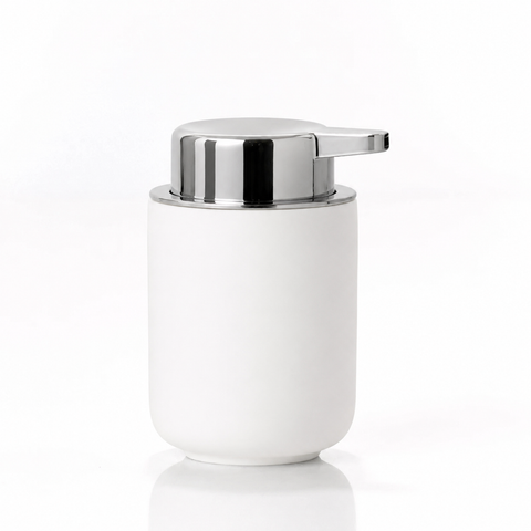 White soap dispenser with silver pump on a white background