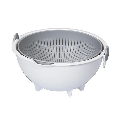 A white plastic colander bowl with a gray perforated inner strainer basket, shown on a plain white background.