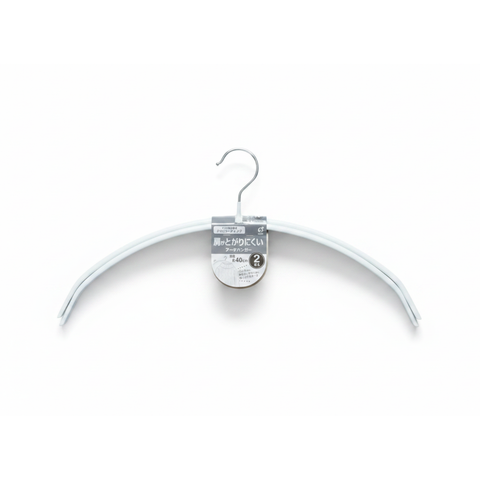 A white plastic hanger with a silver metal hook, shown with its original product packaging label against a plain white background.